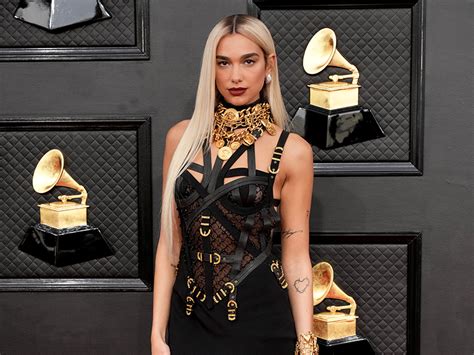 Grammys: Dua Lipa channels Donatella Versace in .